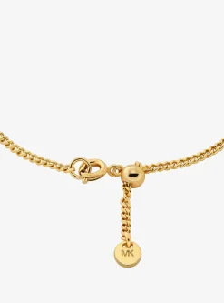 Bracelet à glissière bicolore avec breloque à pierres pavées et logo
