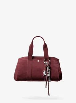 Breloque de sac argentée avec cordon moucheté