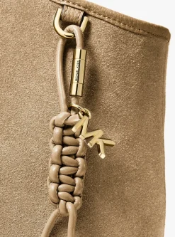 Breloque de sac dorée avec cordon tressé