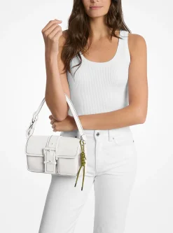 Breloque de sac dorée avec cordon tressé