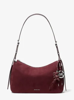 Breloque de sac logo en cuir rembourré