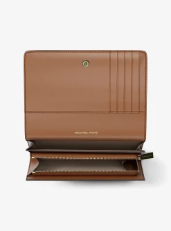 Grand portefeuille Jet Set en cuir grainé