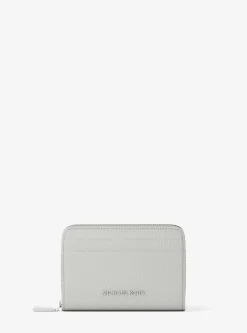 Petit porte-cartes entièrement zippé Jet Set en cuir grainé