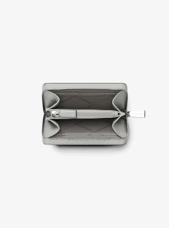 Petit porte-cartes entièrement zippé Jet Set en cuir grainé