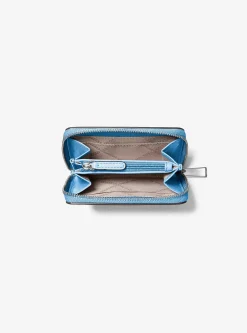 Petit porte-cartes entièrement zippé Jet Set en cuir grainé
