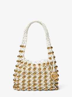 Petit sac bohème porté épaule Gwen en cuir tissé à la main et clouté en édition limitée