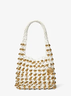 Petit sac bohème porté épaule Gwen en cuir tissé à la main et clouté en édition limitée