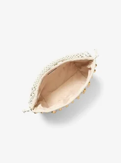 Petit sac bohème porté épaule Gwen en cuir tissé à la main et clouté en édition limitée