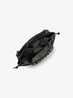 Petit sac bohème porté épaule Gwen en cuir tissé à la main et clouté en édition limitée