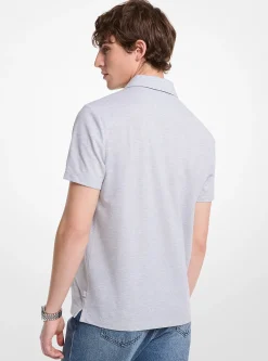 Polo zippé en piqué de coton mélangé