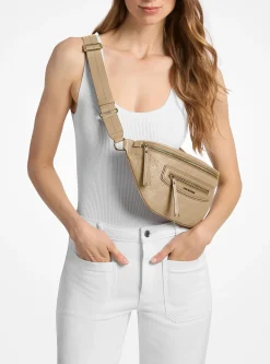 Sac ceinture Jet Set Travel de taille moyenne en cuir à logo en relief